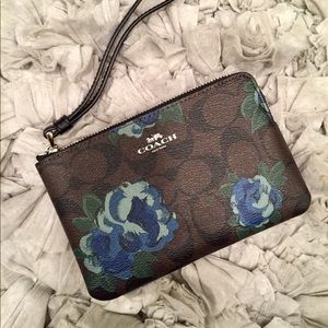 Coach floral wristlet.